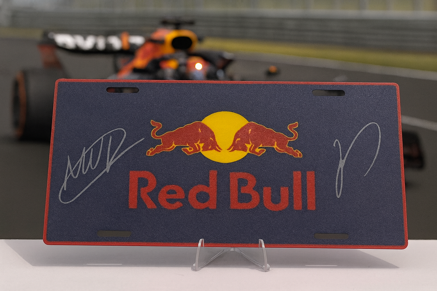 Show your F1 pride with custom racing license plates and RFID wallets. Premium designs featuring Red Bull, Ferrari, Mercedes & more. Secure & stylish!