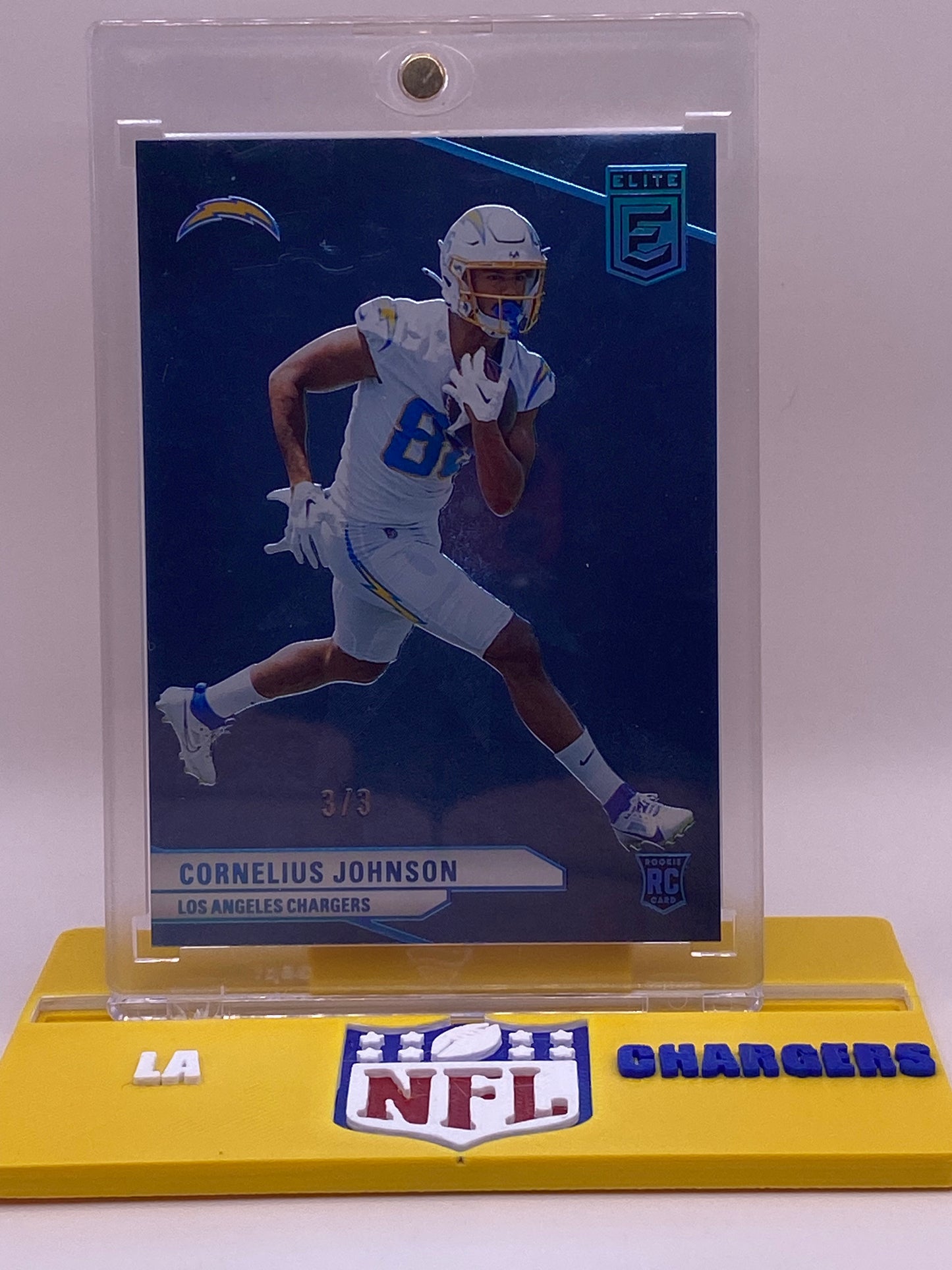 2024 Donruss Elite Cornelius Johnson RC /3 (3/3) – Chargers Rookie + Display Stand Included
