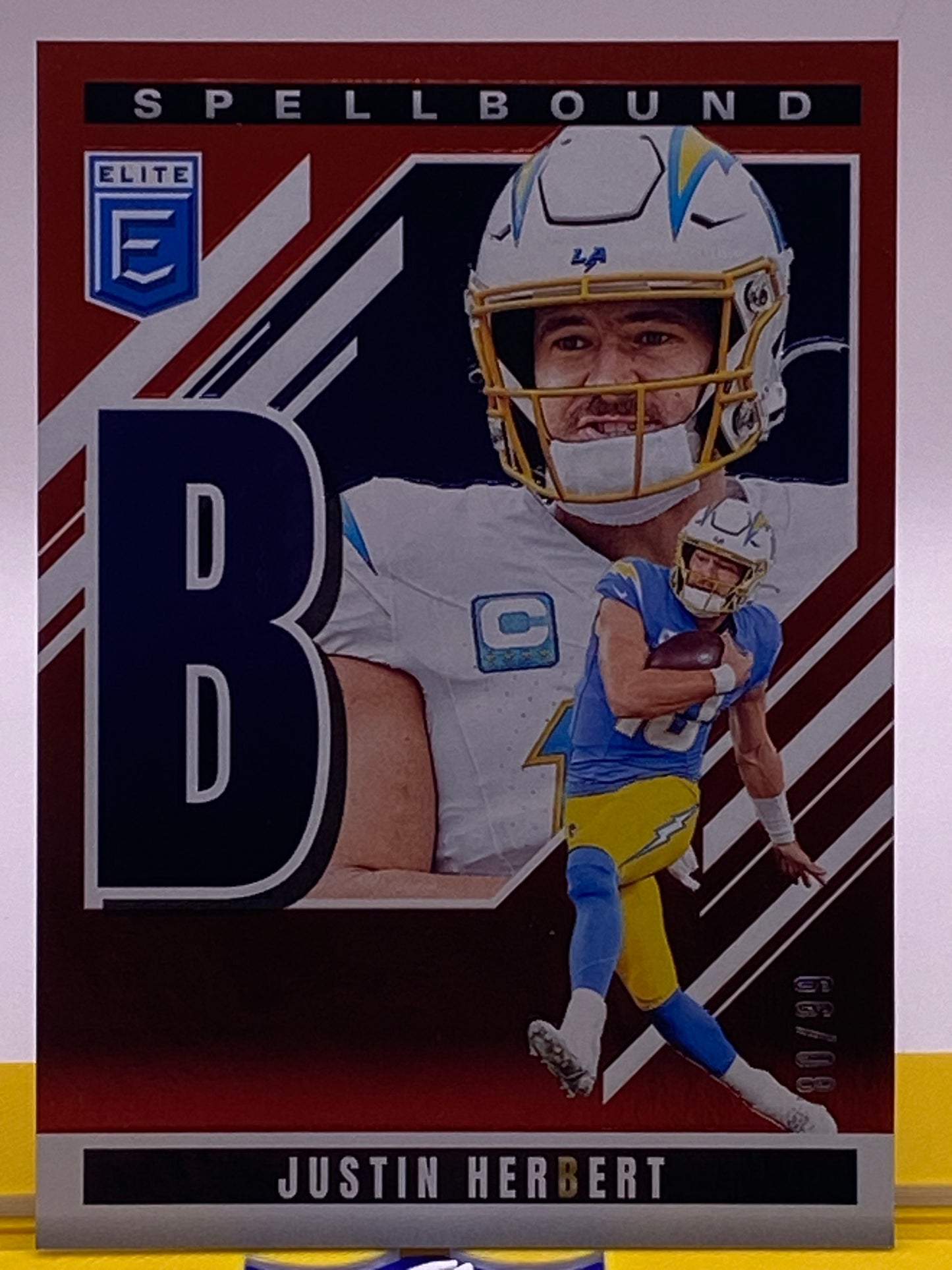 2025 Panini Donruss Elite Spellbound Justin Herbert “B” /99 (80/99) – LA Chargers #37
