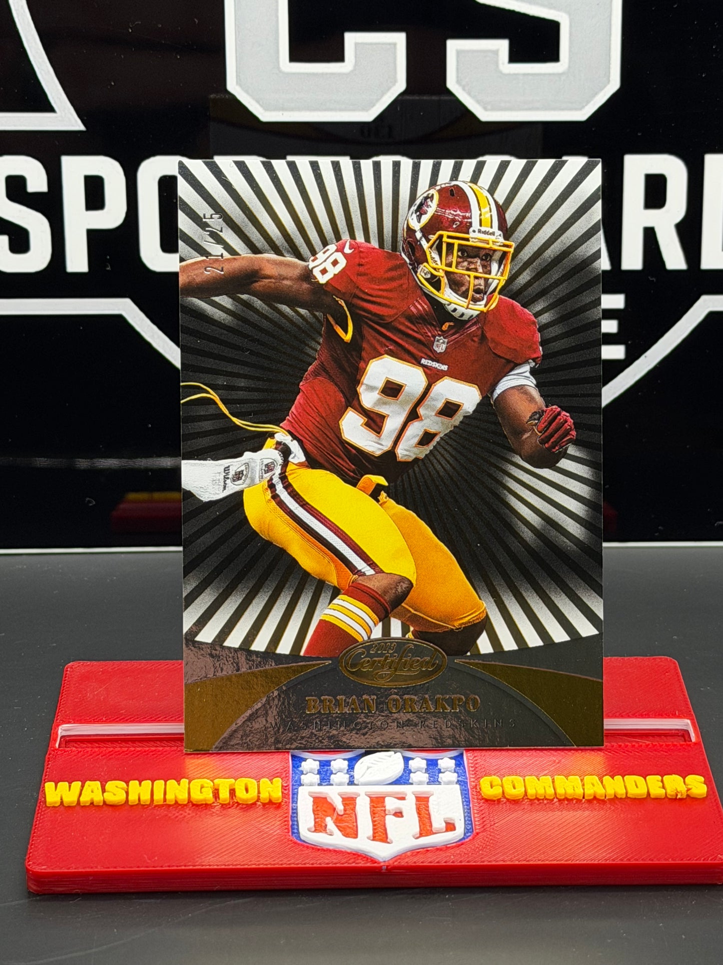 2013 Panini Certified Brian Orakpo Caution Gold 21/25 #130 Washington Redskins